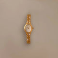 Oval watch with inlay
