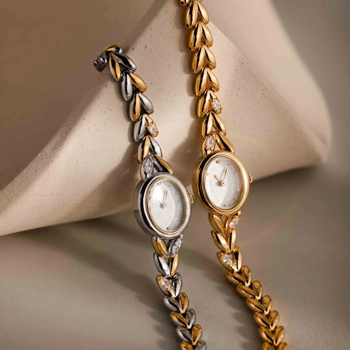Oval watch with inlay