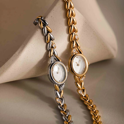 Oval watch with inlay