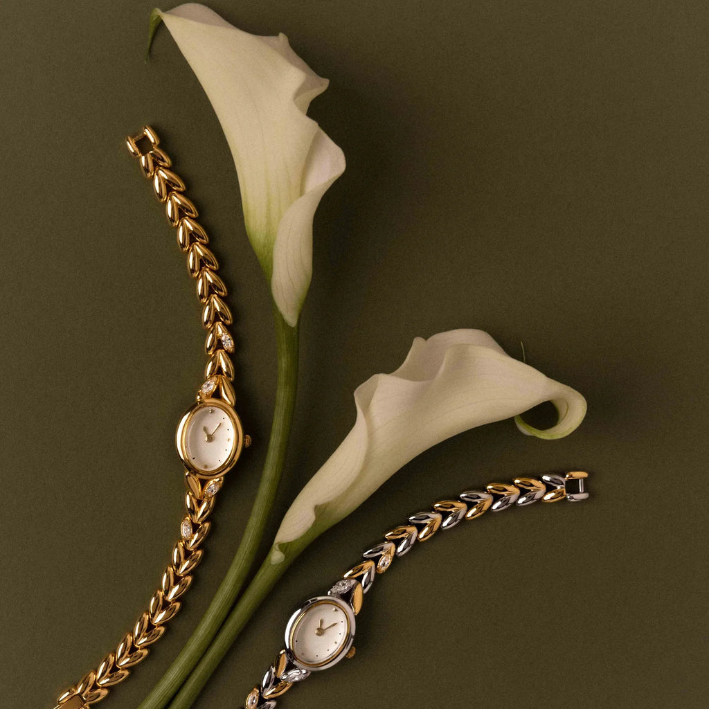 Oval watch with inlay