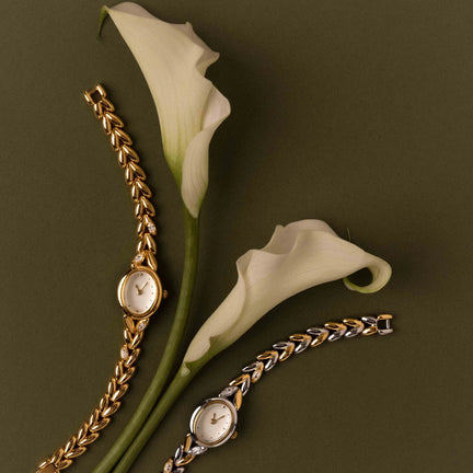 Oval watch with inlay