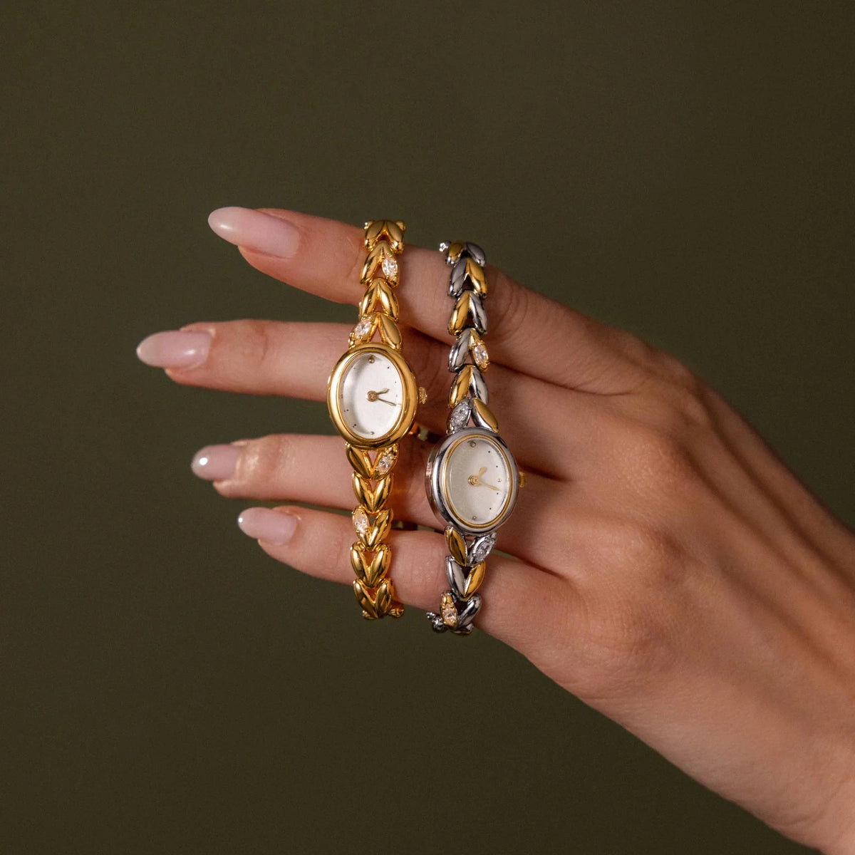 Oval watch with inlay